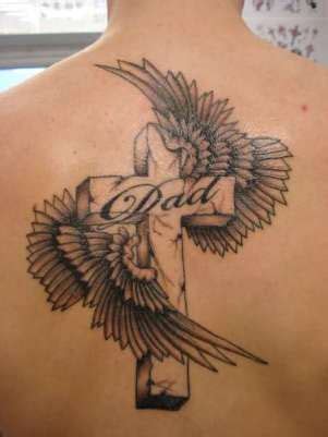 angel on cross tattoo|More.